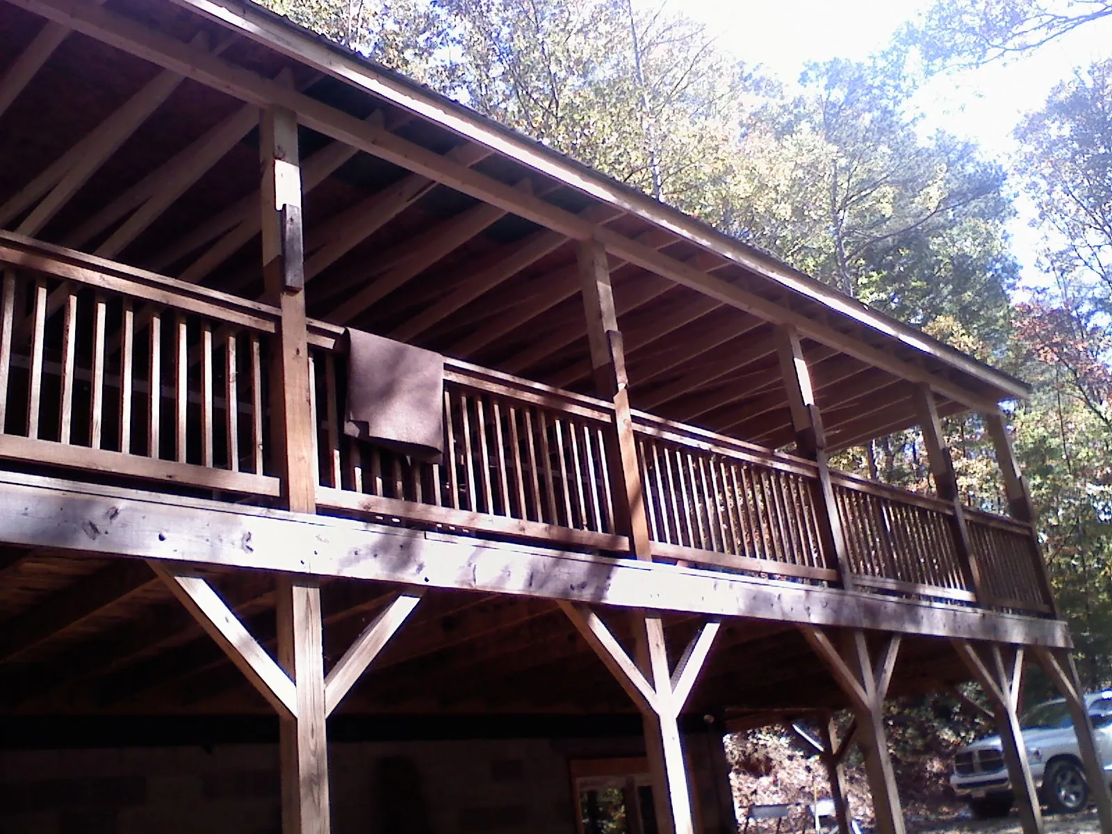 Timber framing under a new elevated porch and deck — Roof Leak Repair in Windsor by Roofing Brothers